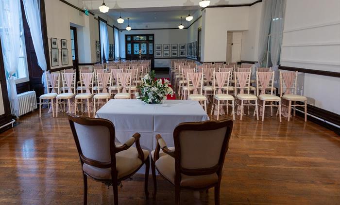 The Assembly Room set up for a wedding ceremony.